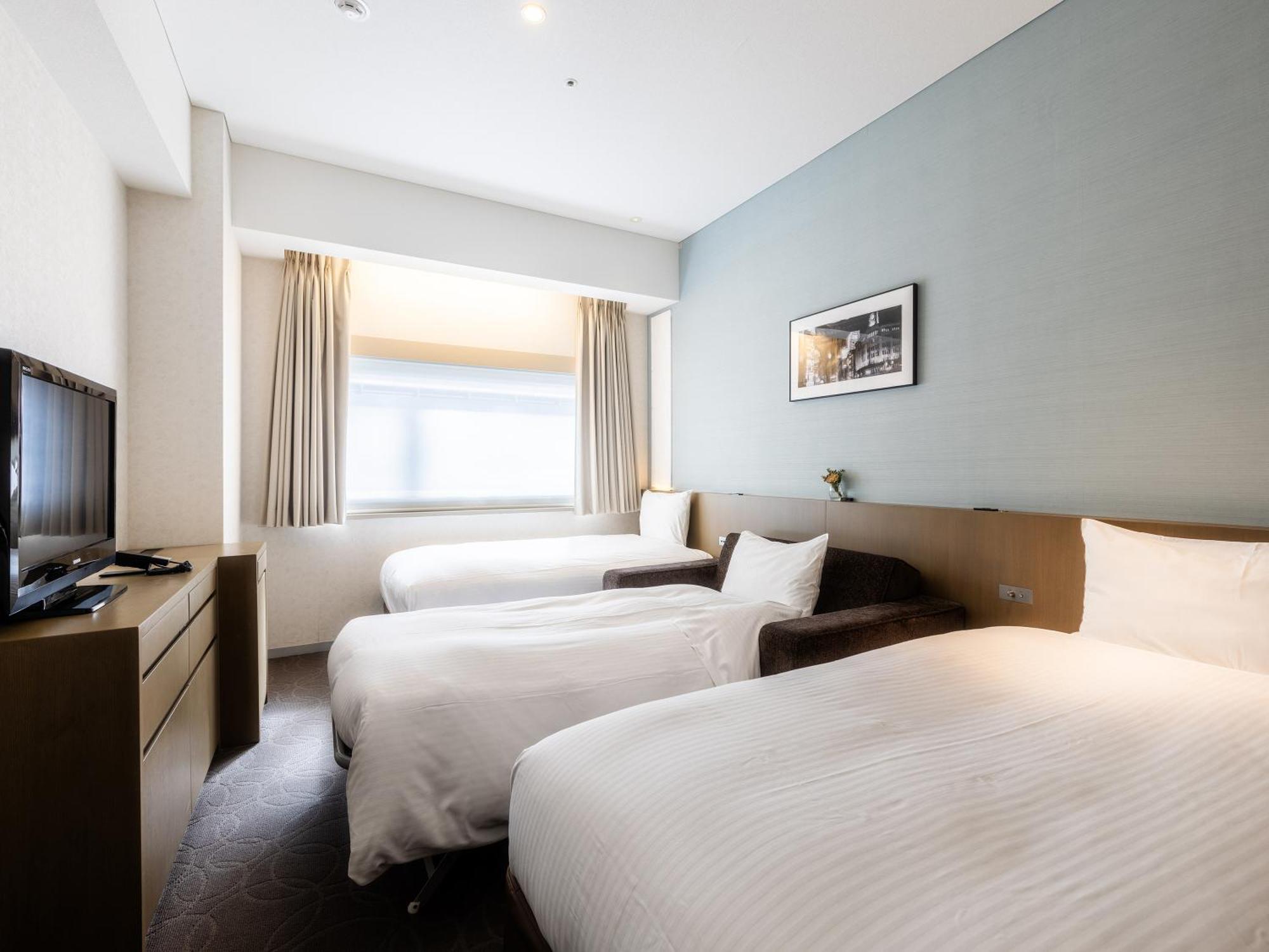 Standaard Kamer met 2 Aparte Bedden en 1 Extra Bed - Rookvrij